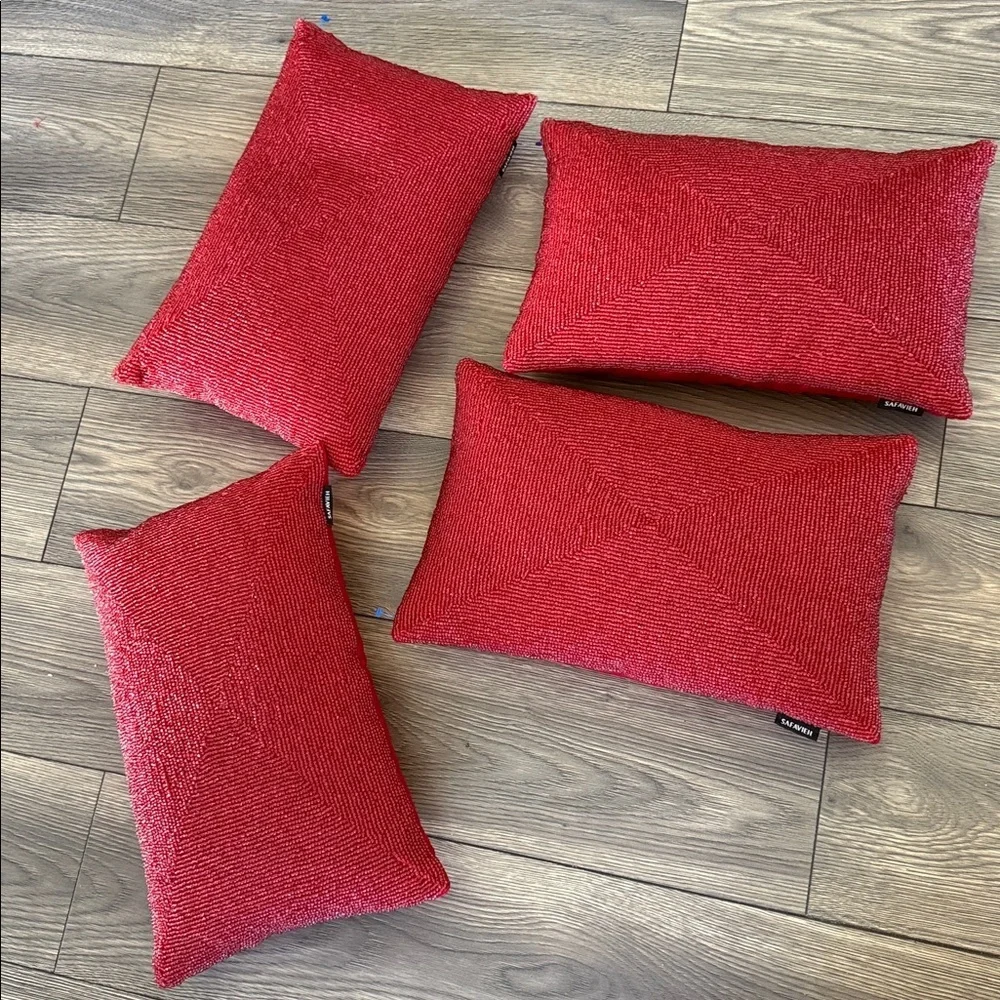 4 SAFAVIEH Beautiful Beaded toss pillows in a rich jewel tone red